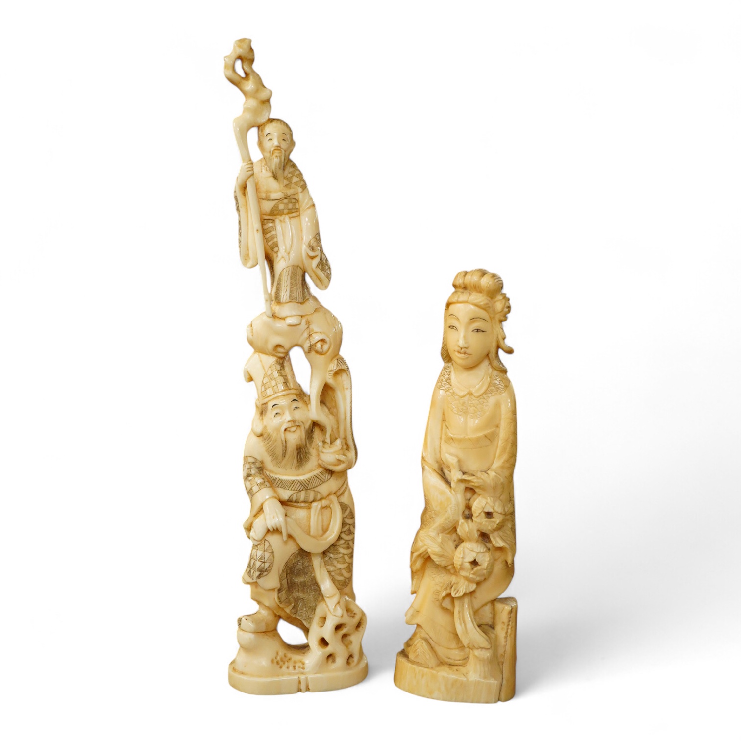 Two early 20th century Japanese walrus ivory carvings, 26cm